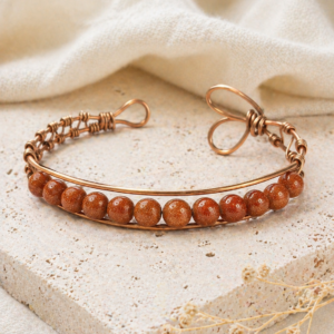 Glow Getter Goldstone Copper Cuff