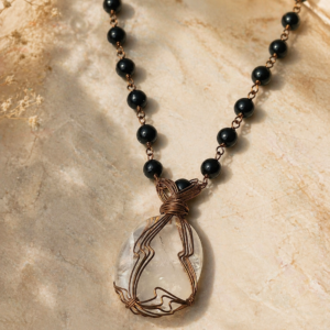 Clear Shield Quartz Palmstone Necklace